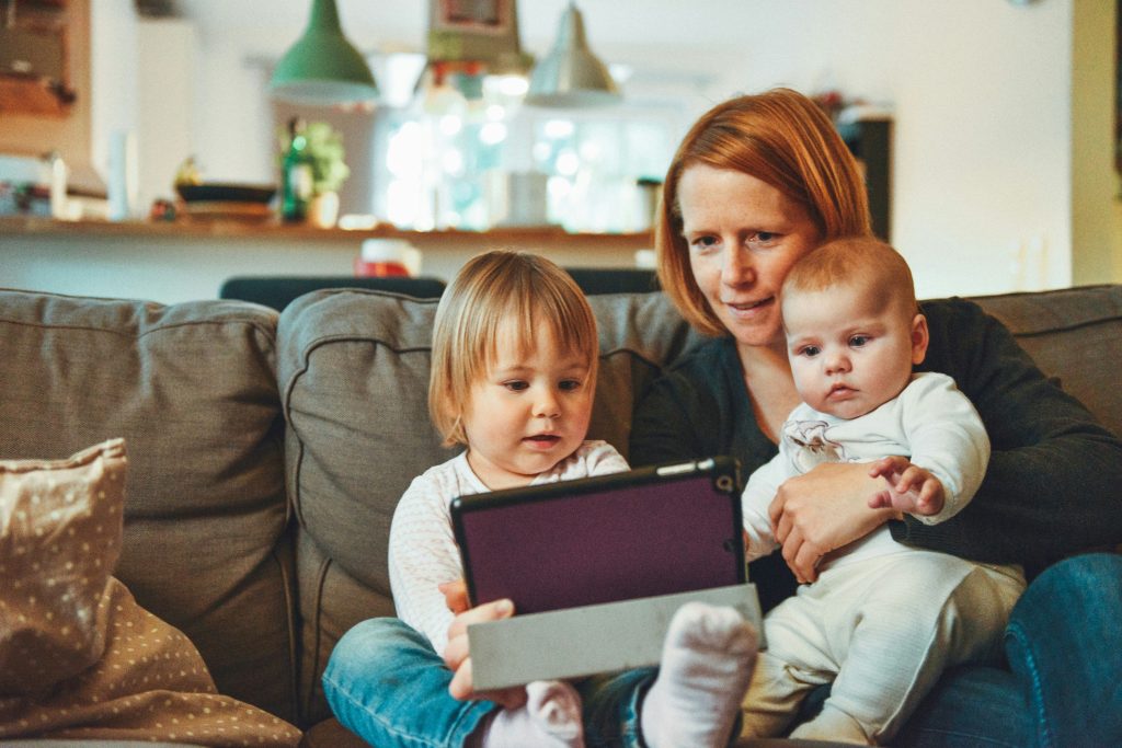 Young family with children discussing financial planning