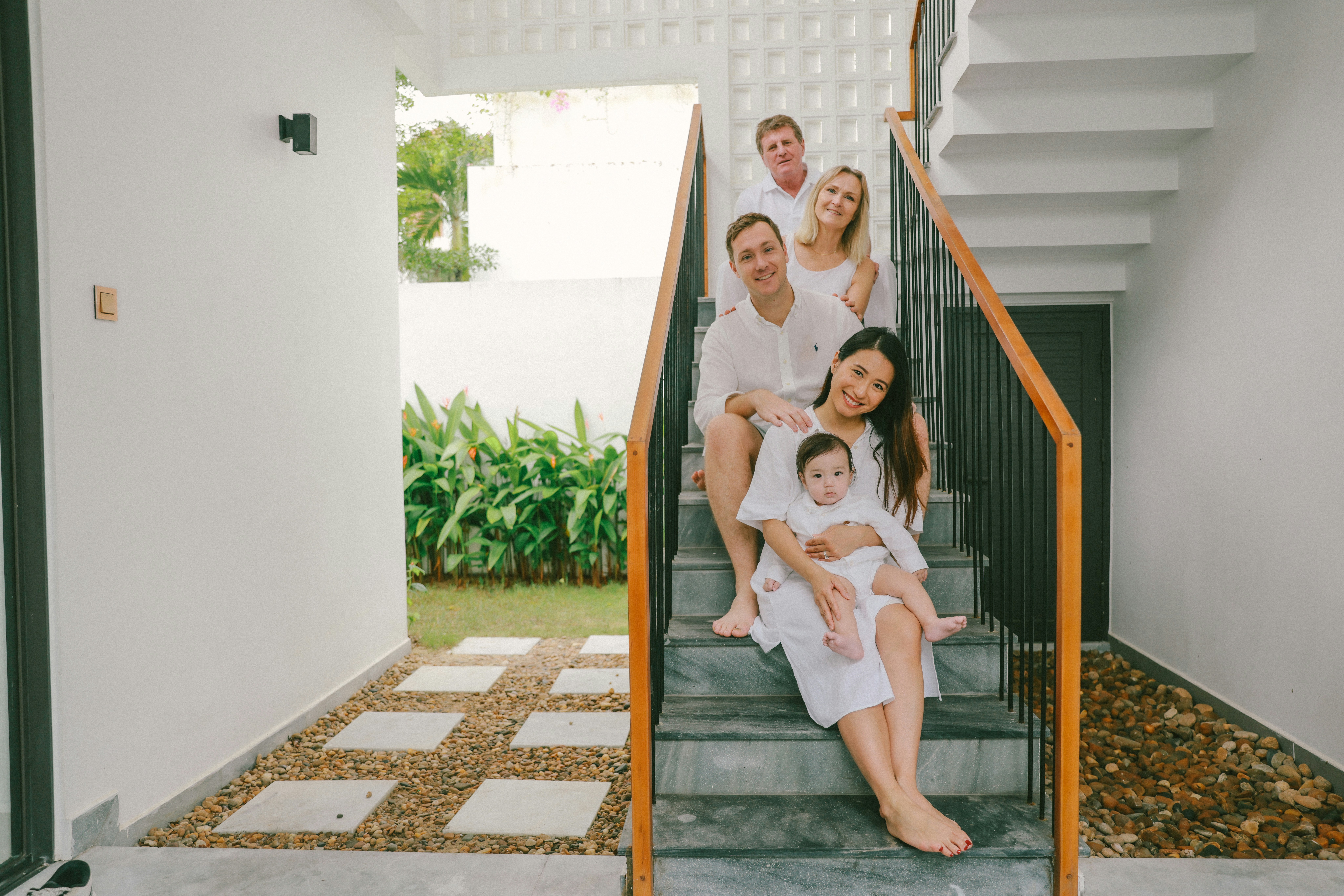 Family celebrating life milestone together at home